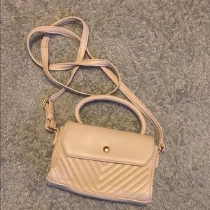 Super cute XSmall tanish cream colored purse with stitching